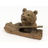 A Black Forest carved wooden bear and log ink stand with pen tray,