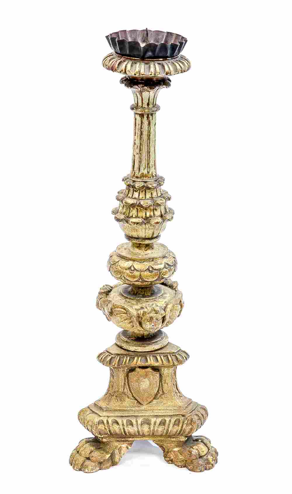 A gilt gesso Spanish style pricket stick, tricorn body with paw feet,