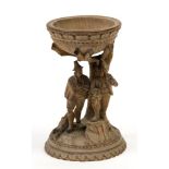 A Black Forest carved figural cup,