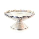 An Art Deco silver pedestal bowl, conical form with crenelated rim E.W. Haywood, Birmingham 1935, 9.