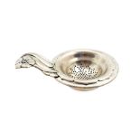 Georg Nilsson for Gero, a Dutch Art Nouveau silver plated tea strainer and stand, Gerofabriek,