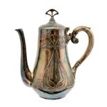 WMF, a Jugendstil silver plated coffee pot and jug, cast with foliate bow design and ivy leaves,