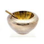 Barry Thomas, a Modernist silver salt bowl and spoon, hollow, ovoid form, with gilt interiot,