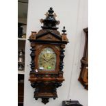 A Victorian mahogany and ebonised Art Nouveau wall clock, brass dial, Roman numerals,