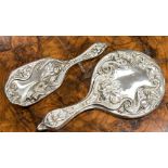 A French circa 1920s, white metal embossed , two piece dressing table set,