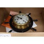 A Schatz Royal Mariner ships bell clock and instructions, West German, in the form of a ships wheel,
