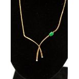 A 9ct gold jade and diamond set necklace,