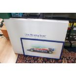 A pair of racing prints comprising: a signed John Hammond print 76/100 and a "The Winning Team" by