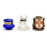 Two glass inkwells and a ceramic inkwell base (3)