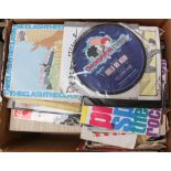 A box containing a quantity of 7" 45 singles, dating 1960s-1980s, including pop, punk, world music,