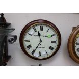A 19th Century wall clock, signed Humphreys and Son, Brighton, on a mahogany case,