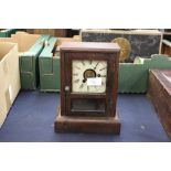 A Seth Thomas rosewood cased mantle clock, having an eight day movement,