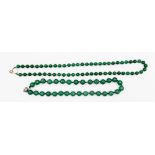 Two dark green bead necklaces one with approx 12mm beads approx 18'' long,