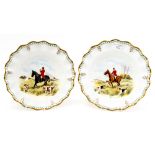 A pair of Royal Crown Derby cabinet plates, each hand painted with Hunting scenes,