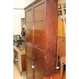 An early 20th Century mahogany bookcase, fitted with a single hanging rail,