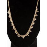 A 9ct three colour gold fringe necklace, with a length of approx 16'' and and a weight of approx 7.