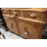 A 1930's Oak Sideboard with bowed front