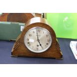 A Garrards oak eight day mantle clock, having a Westminster chime, Art Deco case,