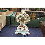 A Continental porcelain clock