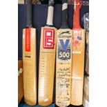 Four signed cricket bats, bearing the names of players, including West Indian Test cricket bat,
