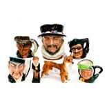 A large Royal Doulton character jug Beefeater, four small jugs, the Mikado Sarey Gamp, the Poacher,