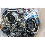 A selection of costume jewellery including plastic, resin, wood metal and bead necklaces,