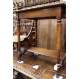 An Edwardian oak side table