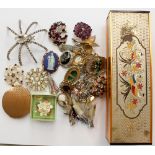 A selection of twenty-nine costume brooches, some boxed,