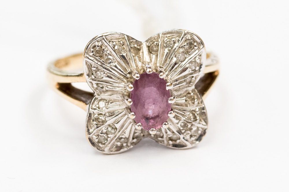 A pink sapphire and diamond fancy cluster 9ct yellow gold and white gold set ring,