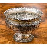 An Edwardian repousse silver footed bowl, makers George Jackson and David Fullerton, London 1900,