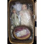 Two papier mache head dolls, both in original clothes,