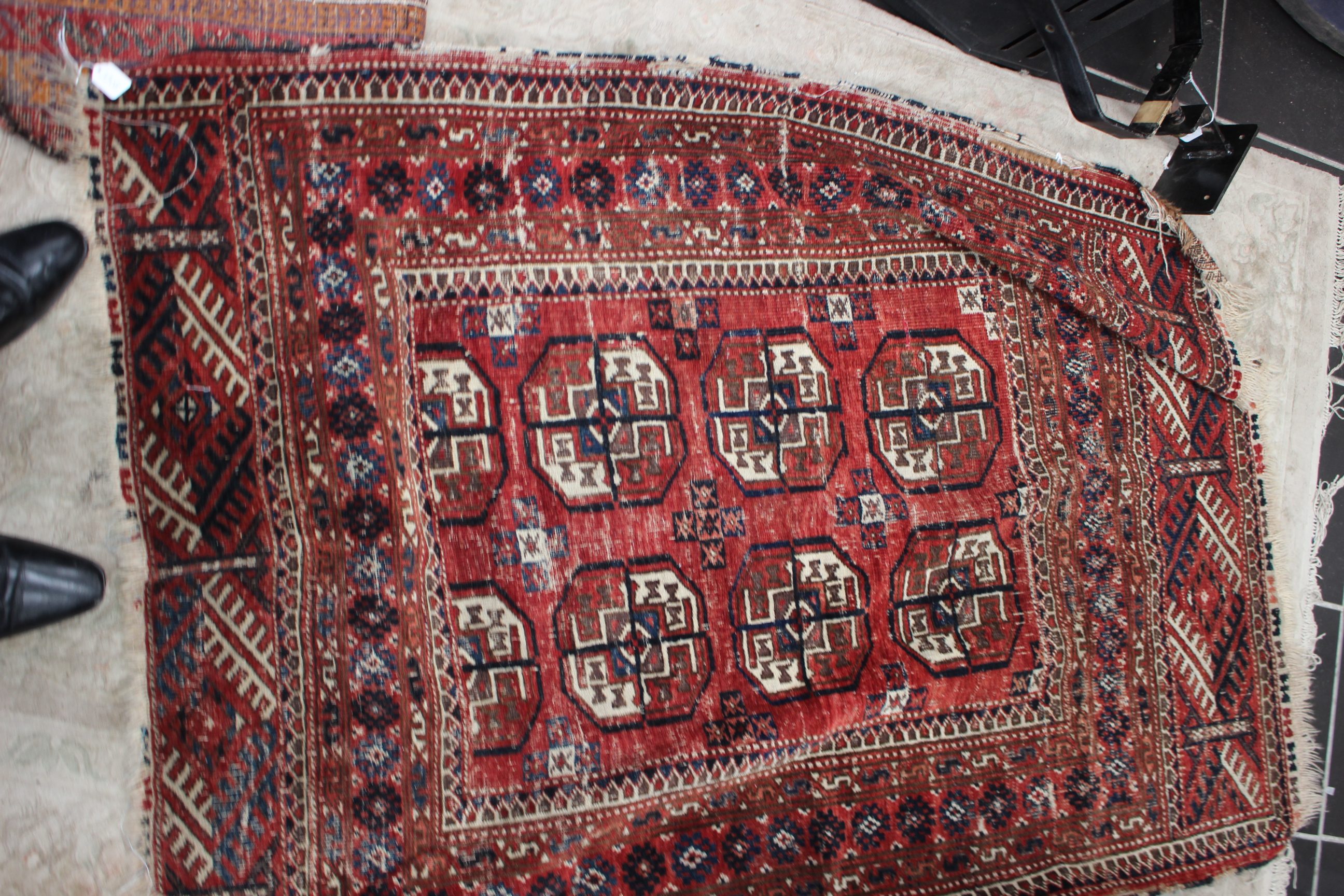 A Persian style rug.