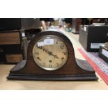 A 1920s oak cased mantle clock