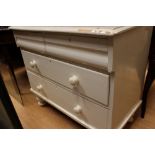 A mid Victorian white painted four drawer chest