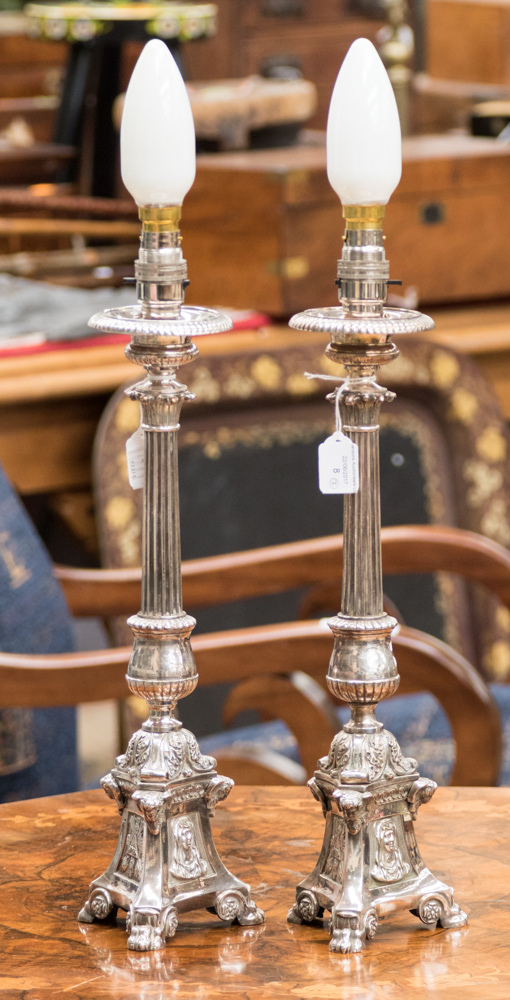 A pair of French silver plated candlesticks - ecclesiastical - converted to lamps