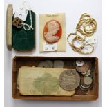 A collection of various coins, dollars etc a silver scouts badge, in original box,