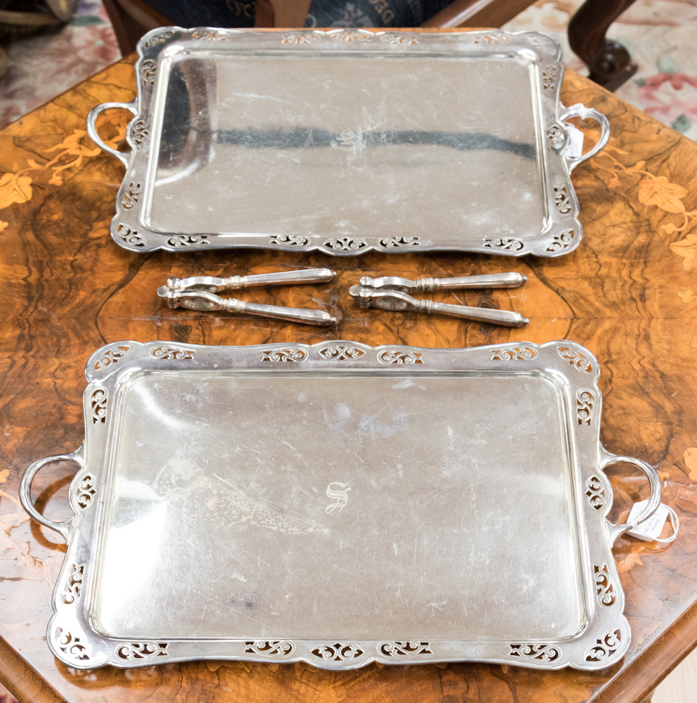 A pair of EPNS trays with heraldry 'invictus maneo' and a boxed pair of nut crackers