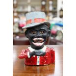 A black man money box with top hat