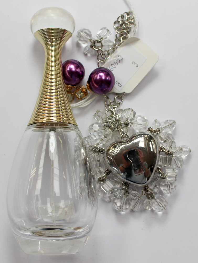 A collection of Dior items to include a pair of Dior double end faux pearl and crystal earrings,
