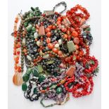 A large quantity of semi precious and polished agate necklaces to include Jasper, amethyst,