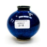 A Moorcroft bulbous blue vase, incised W to the base,