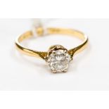 A diamond solitaire claw set in 18ct white and yellow gold, diamond weight approx 0.