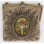 A French 1920s beadwork and embroidered evening bag with enamel flower detail with border a/f