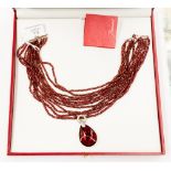 A Baccarat Limited Edition red crystal ten row sterling silver necklace,