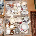 Two boxes of assorted jugs, some graduated sets,