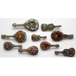 A group of nine Italian made Micro Mosaic brooches in the form of Guitars and Mandolins (9)