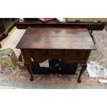 A George II oak lowboy,