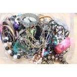 A selection of costume including wooden bead necklaces & bracelets, plastic, shell,