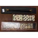 Two boxed sets of dominoes, together with an ebony rule.