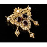 A 9ct gold, garnet and half pearl set drop pendant brooch,